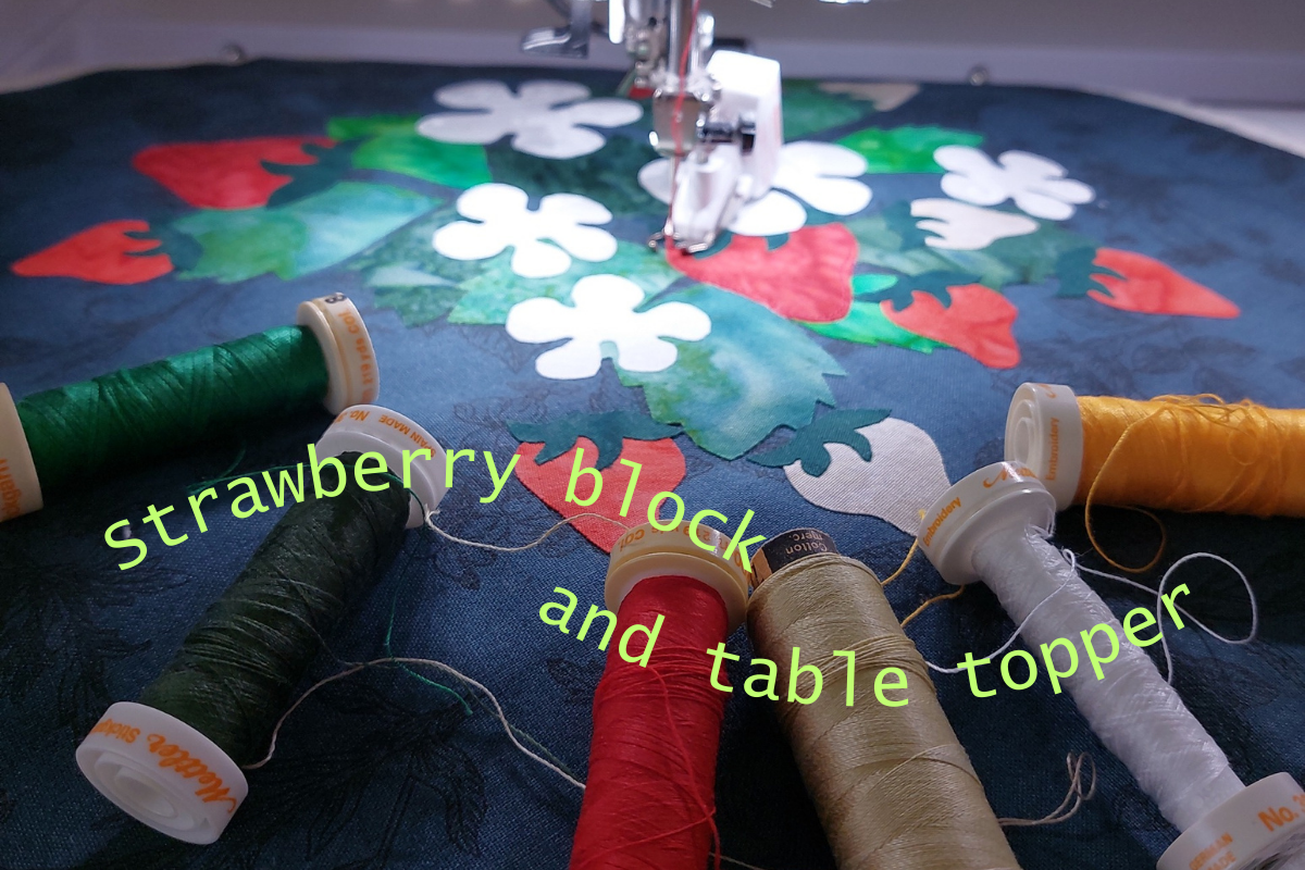 Strawberry block and threads, ready for quilting