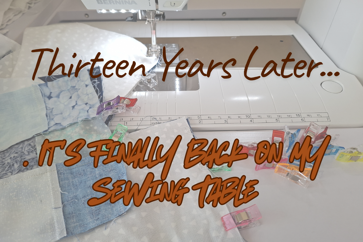 A close-up of a sewing machine on a white table with fabric pieces laid out underneath. Large overlaid text reads 'Thirteen Years Later.